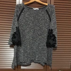 Size 2 Maurice’s knit top. Never worn.